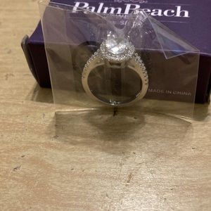 Single Halo Oval Ring.